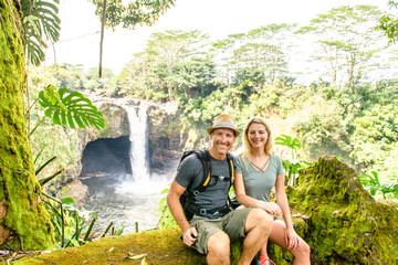 A couple at The Rainbow Falls, Hilo, Wailuku River State Park, Big Island, Hawaii