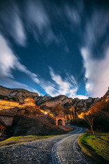 Mtskheta, Georgia. Shio-mgvime Monastery. Medieval Monastic Shio-Mgvime Monastery Shiomgvime Complex In Limestone Canyon Under Autumn Starry Night Sky. Starry Sky Above Famous Place In Limestone