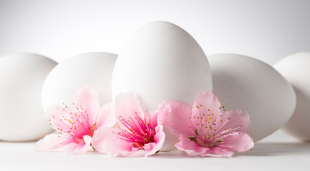 white eggs with peach flowers