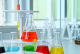 Chemical tube set development and pharmacy in laboratory with multicolored substances in laboratory - Image