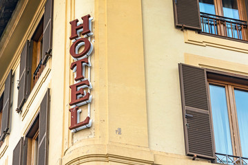 Hotel sign on wall facade