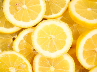 lemon wedges lies on a bright background