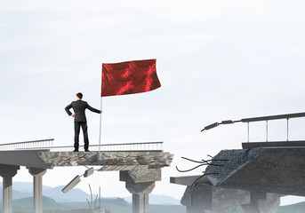 Man with flag presenting leadership concept.