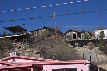 Miami, Arizona. U.S.A. January 30, 2018.  Arizona copper mining ghost-town in ruins: boom 1910 to bust 1950s.  Time, weather, fire and vandalism brought blight that shuttered Miami’s buildings, homes 