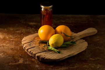 Lemon and honey on table