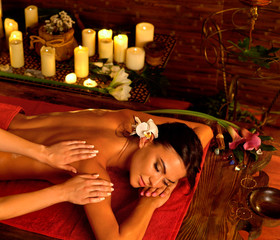 Massage and aromatherapy of woman in oriental renovation
