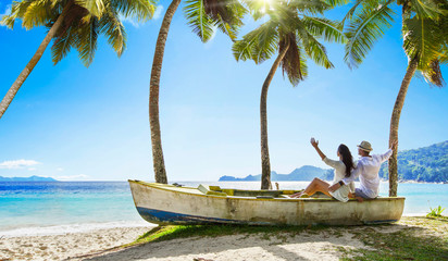 Happy Couple Relaxing on the Ocean. Seychelles island