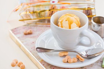 Affogato coffee with ice cream on a cup on marmor background 