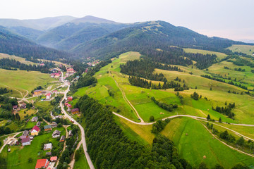 Forests, meadows  and hills of the Carpathian mountains taken with drone, Ukraine