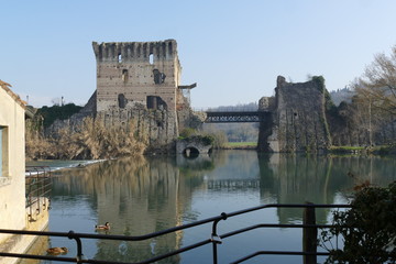 panorama of Roman bridge on Mincio river from the medieval village of Borghetto