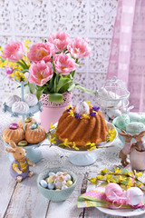 easter festive table with traditional pastries and decorations