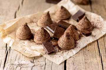 Homemade Tasty Chocolate Truffle Candy on the Old Wooden Background Tasty Candy