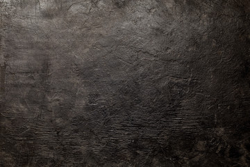 black concrete background aged with spots for photos