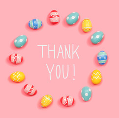 Thank you message with round frame of Easter eggs