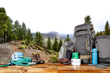 Backpack and mountains landscape 