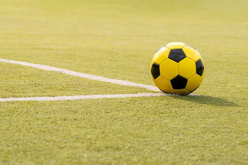  Soccer ball on artificial green turf