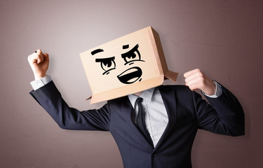 Man with cardboard box head
