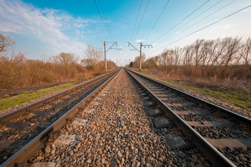 Train rails in country landscape