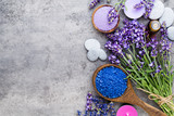 Essential lavender salt with flowers top view.