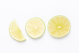 Composition with fresh ripe limes on light background, top view