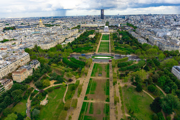 Aerial view of Champ de Mars from the top of Eiffel tower in cloudy day in Paris