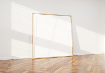 Wooden frame leaning in bright white interior with wooden floor mockup 3D rendering