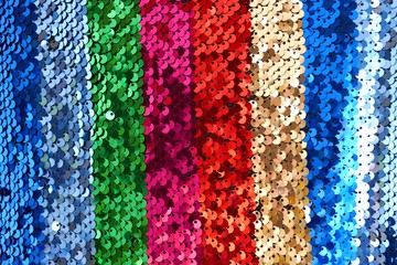 Sequins background.sequins striped fabric.Texture scales with Sequins .Sequins multicolored stripe.Scales background.Shiny texture sequin material