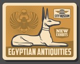Ancient Egypt God Anubis statue and scarab beetle