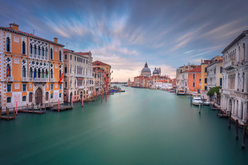 Venice, Italy. Cityscape image of Grand Canal in Venice, with Santa Maria della Salute Basilica in the background, during sunset.