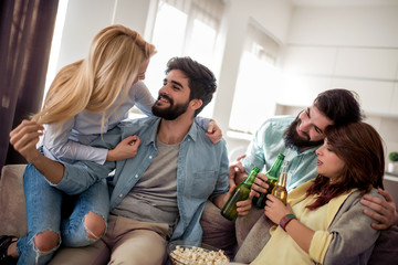 Group of friends together at home