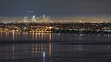 Time-lapse of Manhattan Beach with Downtown Los Angeles in the background.