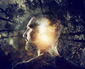 Boy with a mystical forest in mind. Double exposure