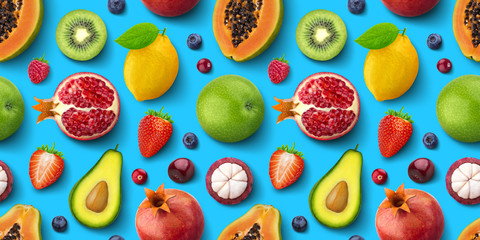 Seamless pattern of different fruits and berries, flat lay, top view, tropical and exotic texture