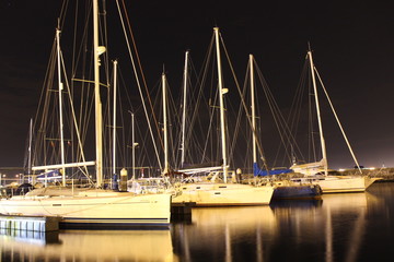 Boats in the marina at night in Portugal
