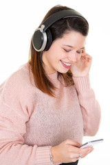 Woman young listening to music on the phone girl student
