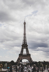 Eiffel Tower view in Paris, France with cloud sky