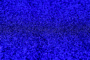 Blue glitter abstraction background.  selective focus