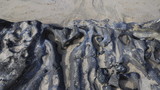 sable et roche sur une plage de l'Atlantique