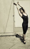 Dancer with black leotard and ballet tips