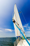Yachting on sail boat during sunny weather