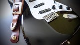 electric guitar and guitar straps . closeup