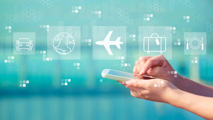 Airplane travel theme with person holding a white smartphone
