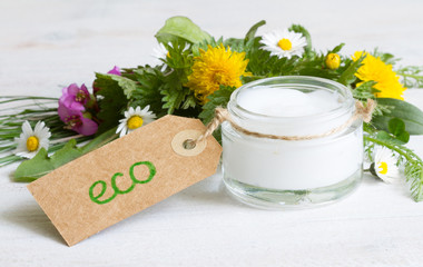 Natural cosmetics for skin care cream  eco label with herbs and flowers