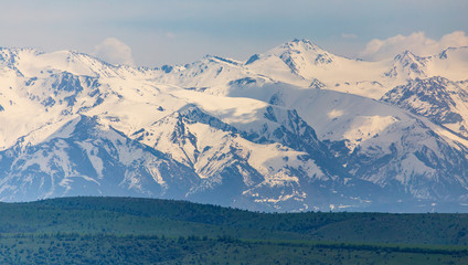 Snowy peaks of mountains in spring in Kazakhstan