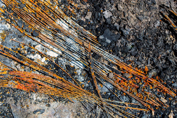 Metallic threads in the burned wheel of the car as a background