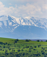 Snowy peaks of mountains in spring in Kazakhstan