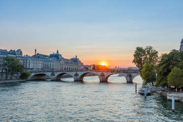 Sunset view of Seine river in Paris, France. Architecture and landmarks of Paris. Postcard of Paris