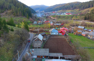 aerial view of village in the spring. counrtyside of Poiana Teiului, Romania