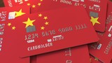 Pile of credit cards with flag of China. Chinese banking system conceptual 3D animation