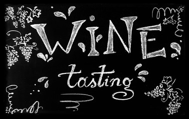 Wine tasting concept. Chalkboard with handwritten chalk lettering Wine tasting.